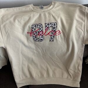 Travis Kelce 87 cheetah crewneck